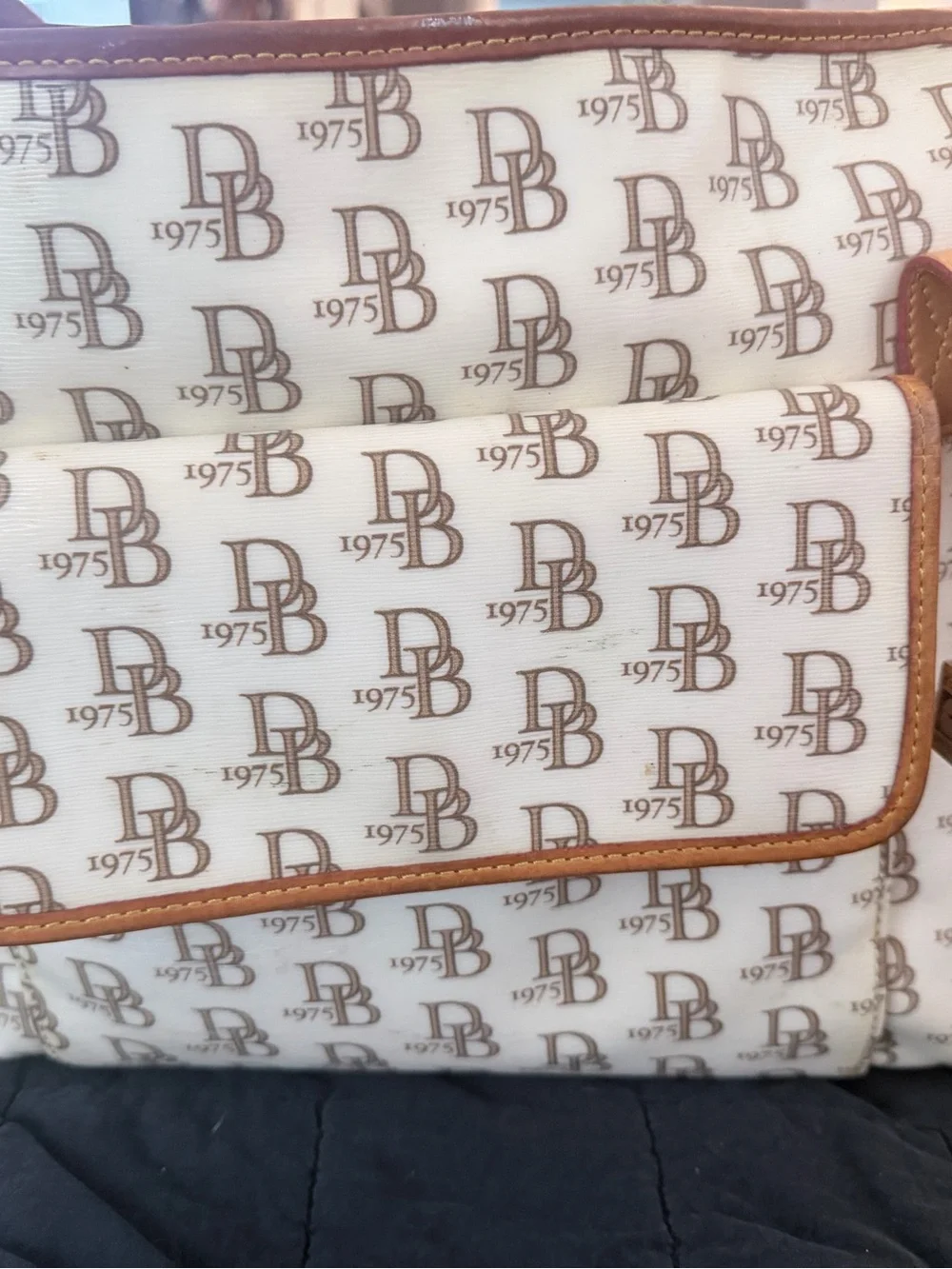 Dooney & Burke Monogram Leather Baby Bag in Cream and Tan